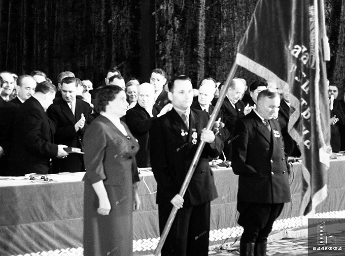 The ceremony of awarding the BSSR with the Order of Lenin during the solemn meeting dedicated to the 40th anniversary of the formation of the BSSR and the CPB, in the State Order of Lenin Academic Bolshoi Opera and Ballet Theater of the BSSR; in the center of the presidium: I Secretary of the Central Committee of the CPSU N.S.Khrushchev, to the right of the standard–bearer - chairman of the collective farm 